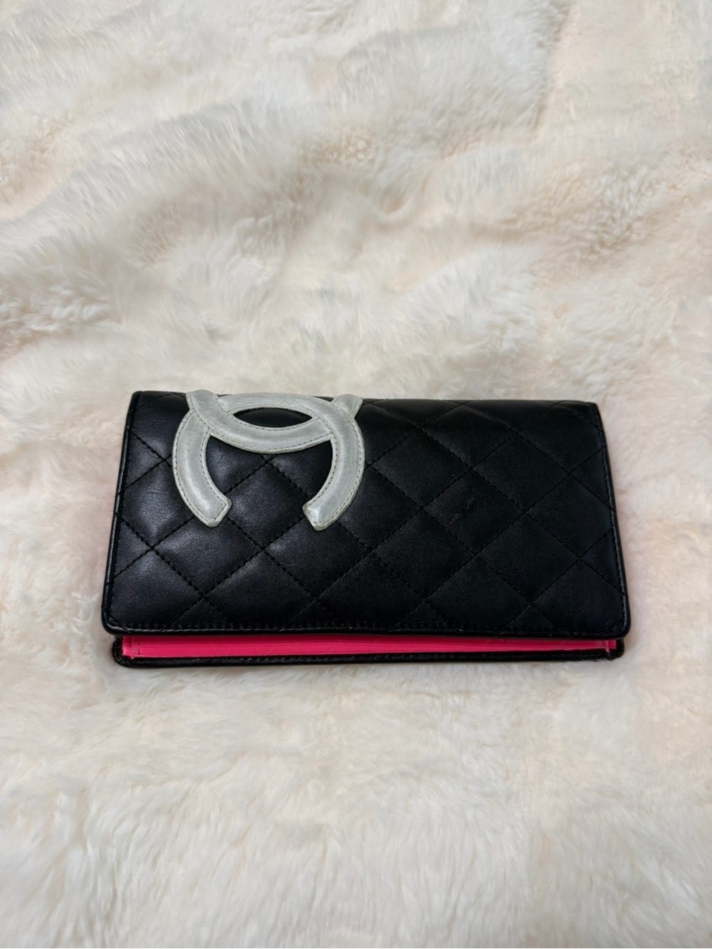 CHANEL Quilted Black Leather Trifold Wallet with White Accent